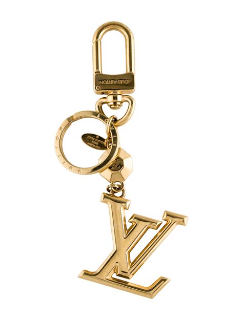 lv facettes bag charm &